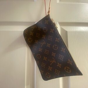 Faux designer wristlet